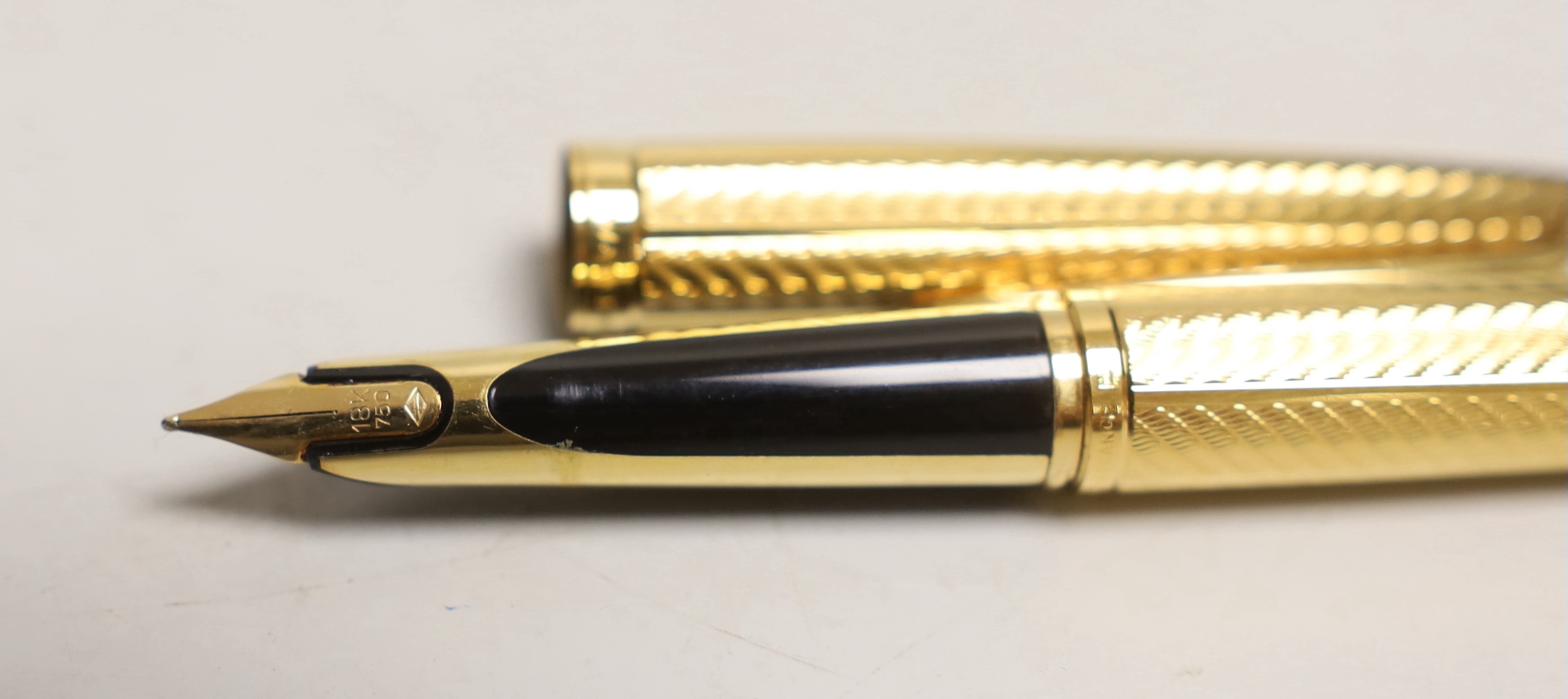 A cased gold plated Waterman fountain pen